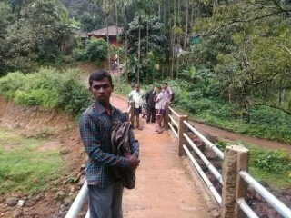 SLP015 Bhamani bridge over the stream with village houses-320x240.png