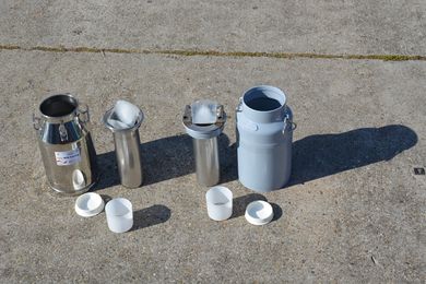 Milk cans with ice compartment.JPG