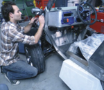 Installing a driving mirror on a vehicle, © Powering Agriculture
