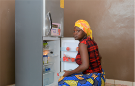 A fridge at the orphanage allows the cook to store fresh food for longer